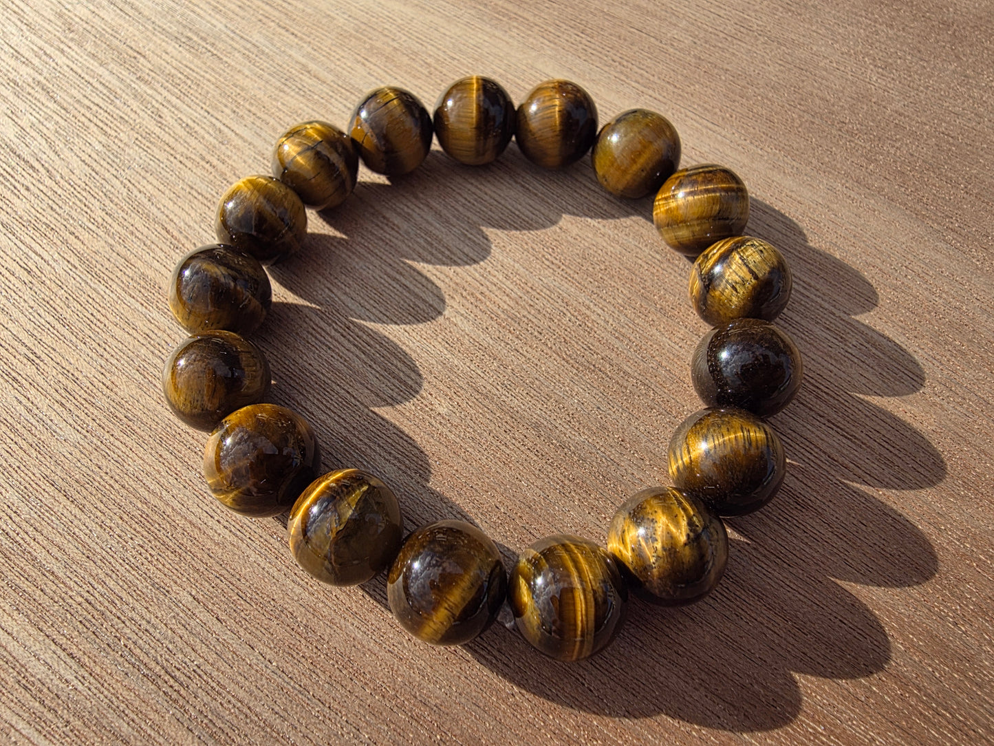Bracelet en Oeil de tigre de perles de 12mm Cristal Roche