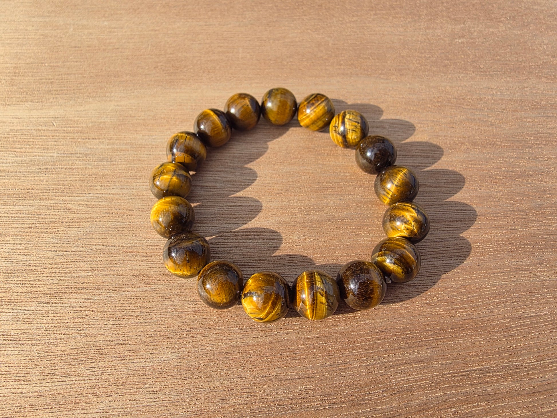 Bracelet en Oeil de tigre de perles de 12mm Cristal Roche
