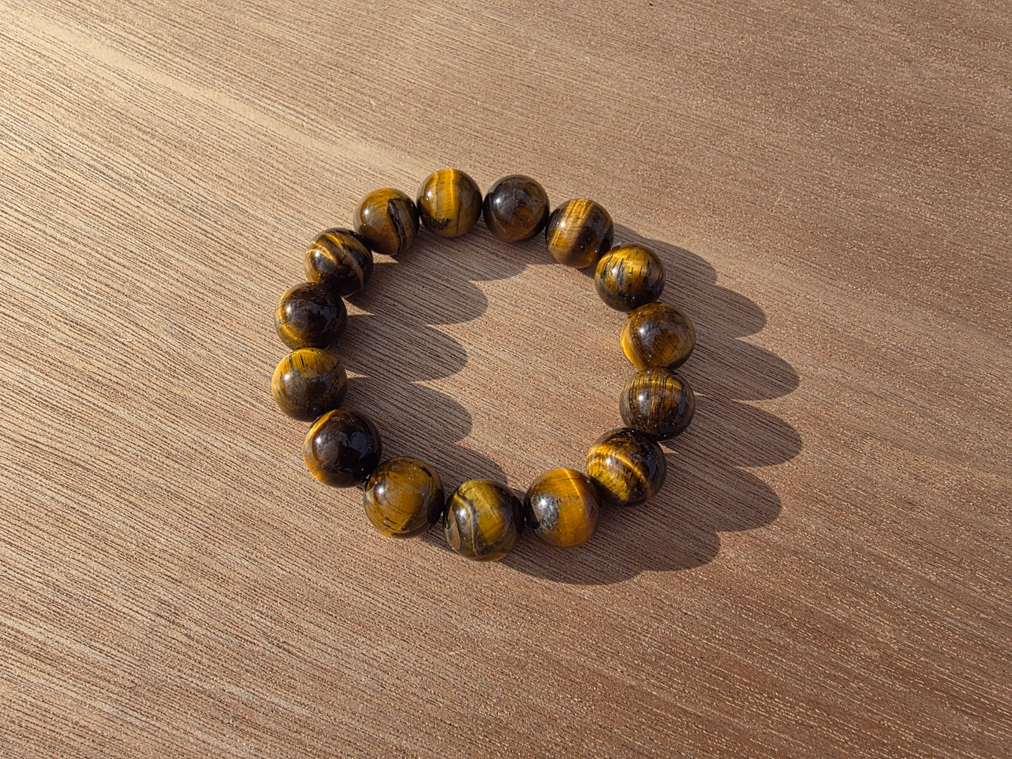 Bracelet en Oeil de tigre de perles de 14mm Cristal Roche