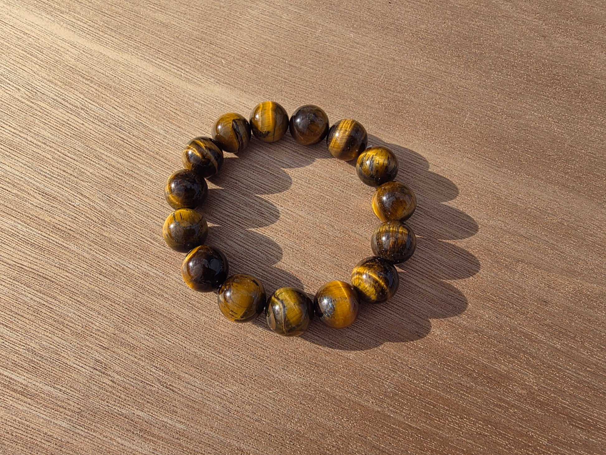 Bracelet en Oeil de tigre de perles de 14mm Cristal Roche