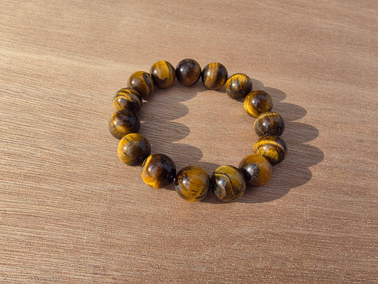 Bracelet en Oeil de tigre de perles de 14mm Cristal Roche