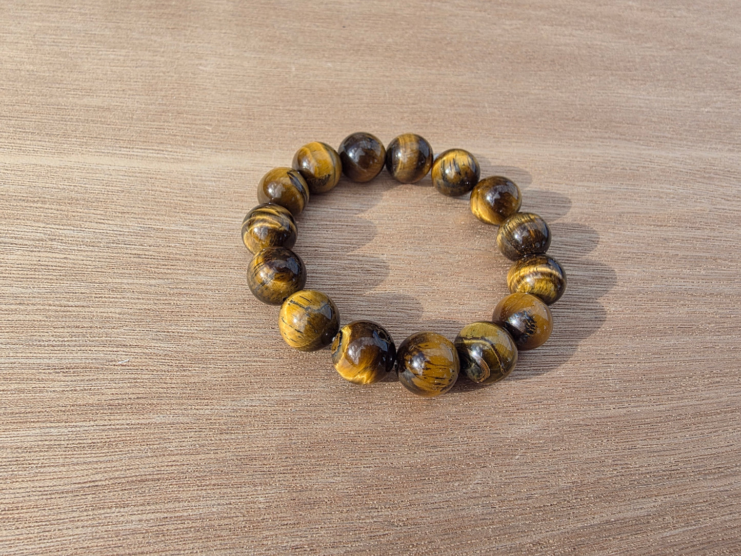 Bracelet en Oeil de tigre de perles de 14mm Cristal Roche