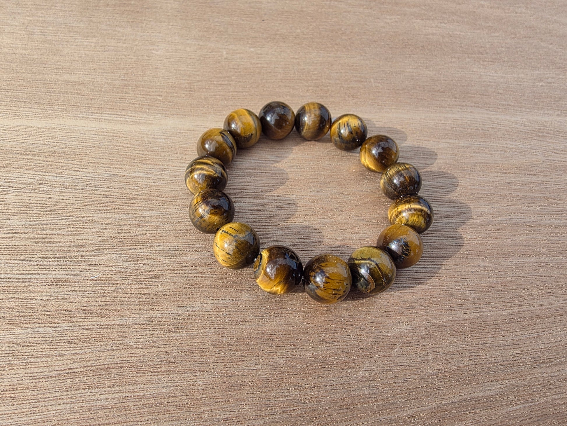 Bracelet en Oeil de tigre de perles de 14mm Cristal Roche