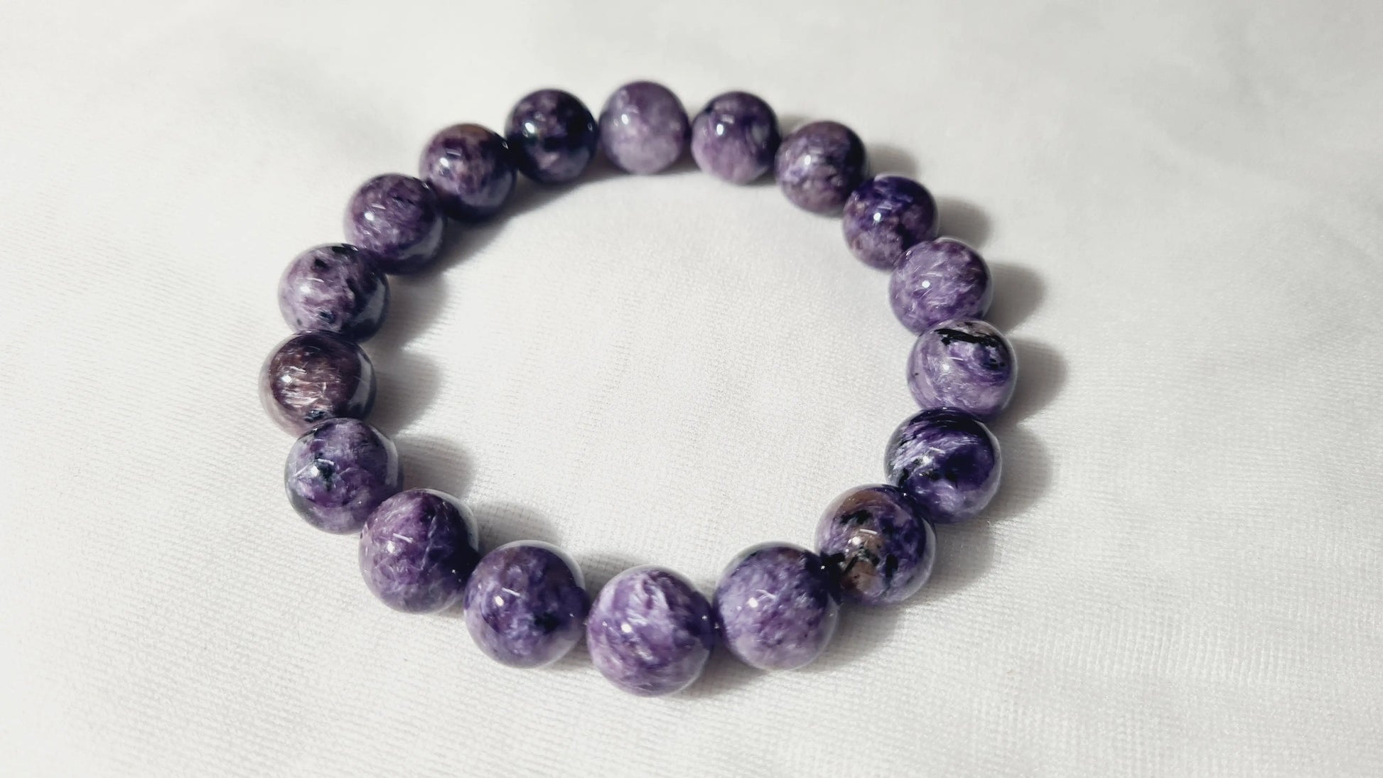 Bracelet en perles de charoïte 12mm / 21.6cm Cristal Roche