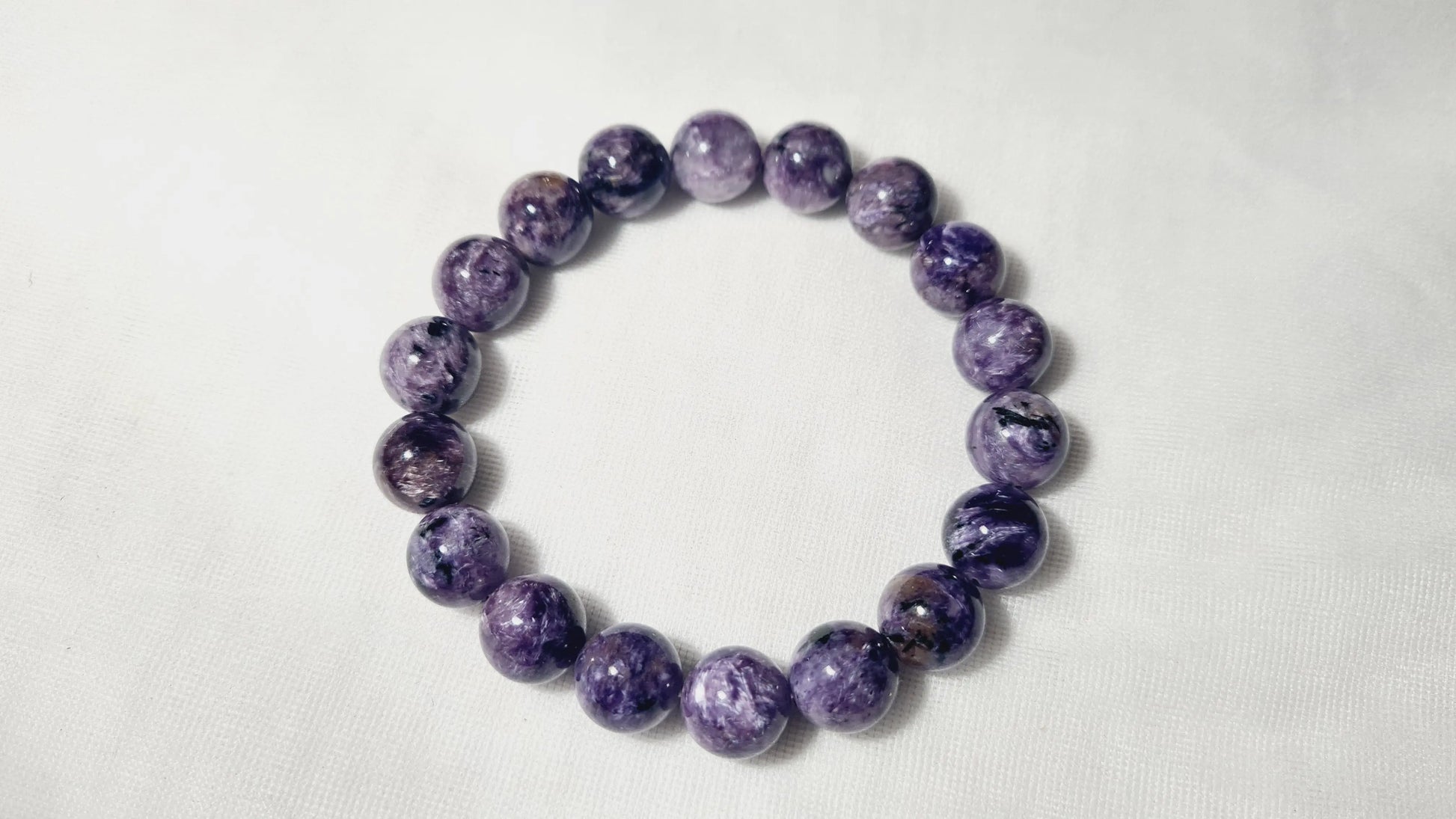 Bracelet en perles de charoïte 12mm / 21.6cm Cristal Roche